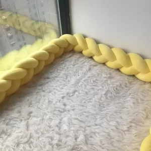 Tresse de lit jaune pour bébé